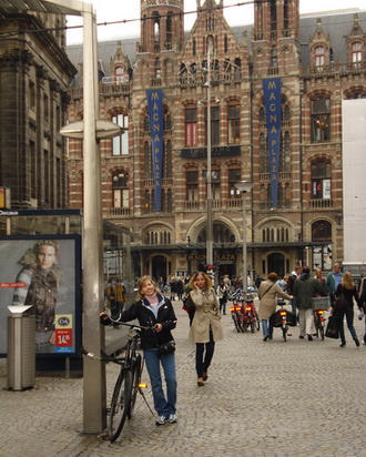 Joan in front of the Magna Plaza Shopping Center Amsterdam